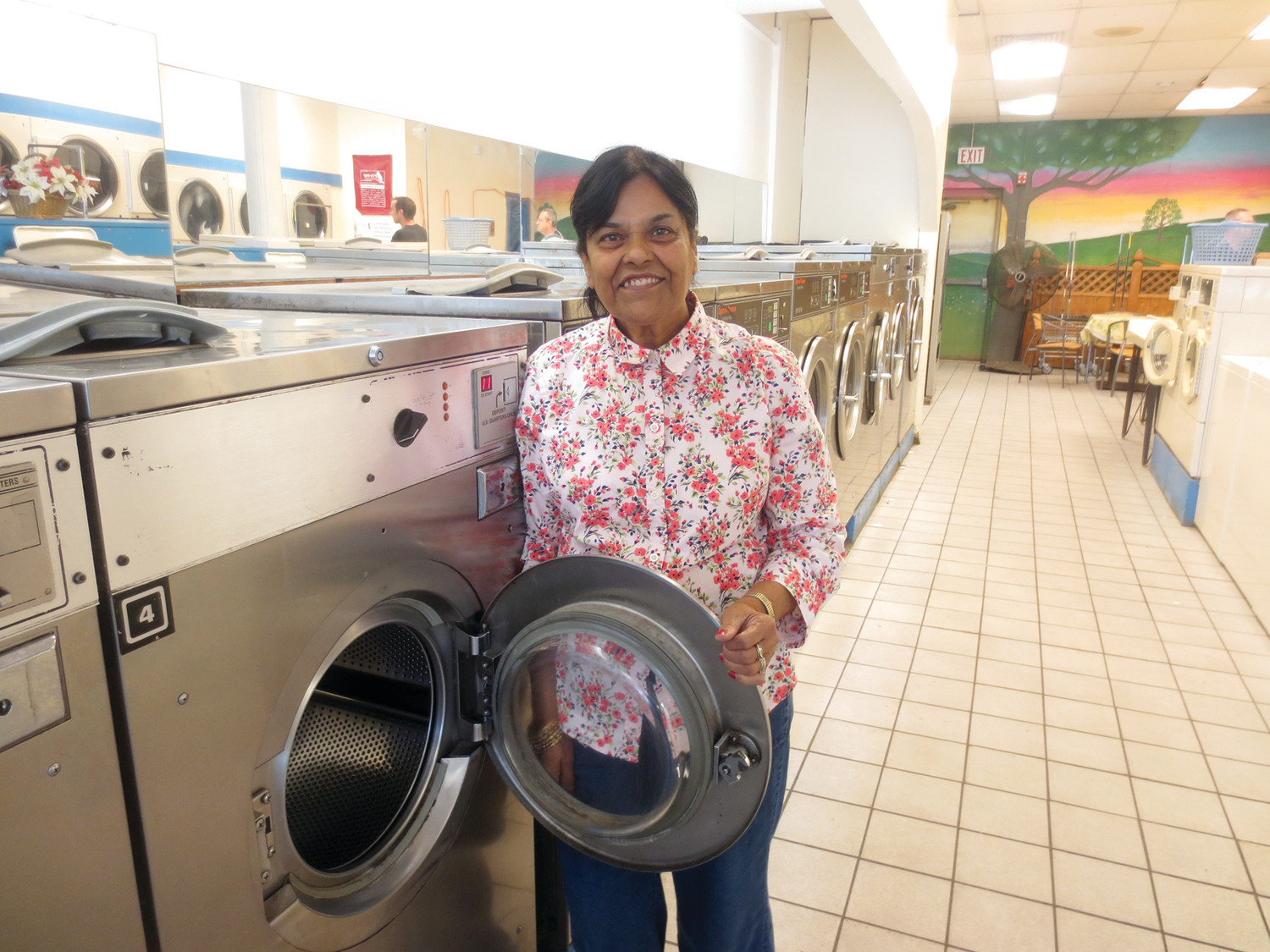 Kaushal Jain is a steady and familiar face at Jain’s Laundry, the family-owned business that she and her husband Sripal have operated for thirty years.